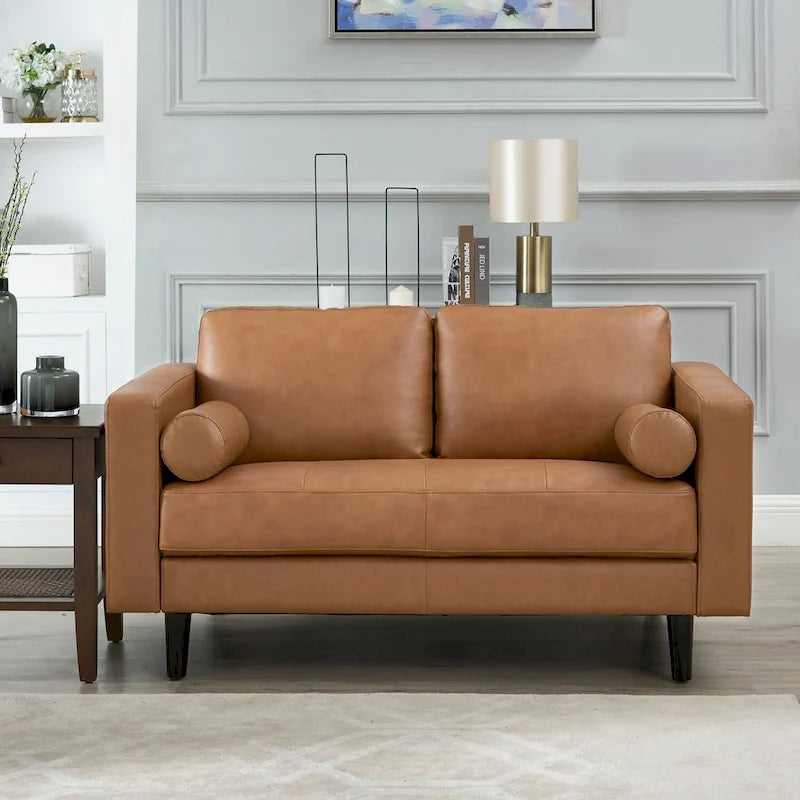 Causeuse de luxe en cuir de vachette avec coussins fermes, design spacieux à 2 places et traversins
