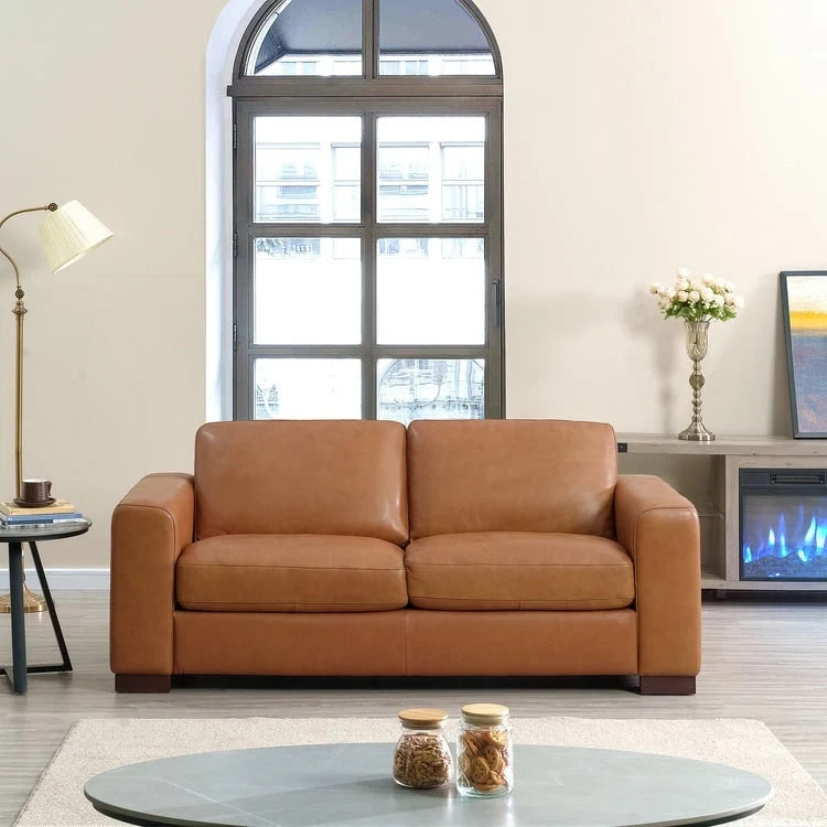 Causeuse de luxe en cuir de vachette avec coussins fermes, design spacieux à 2 places et traversins